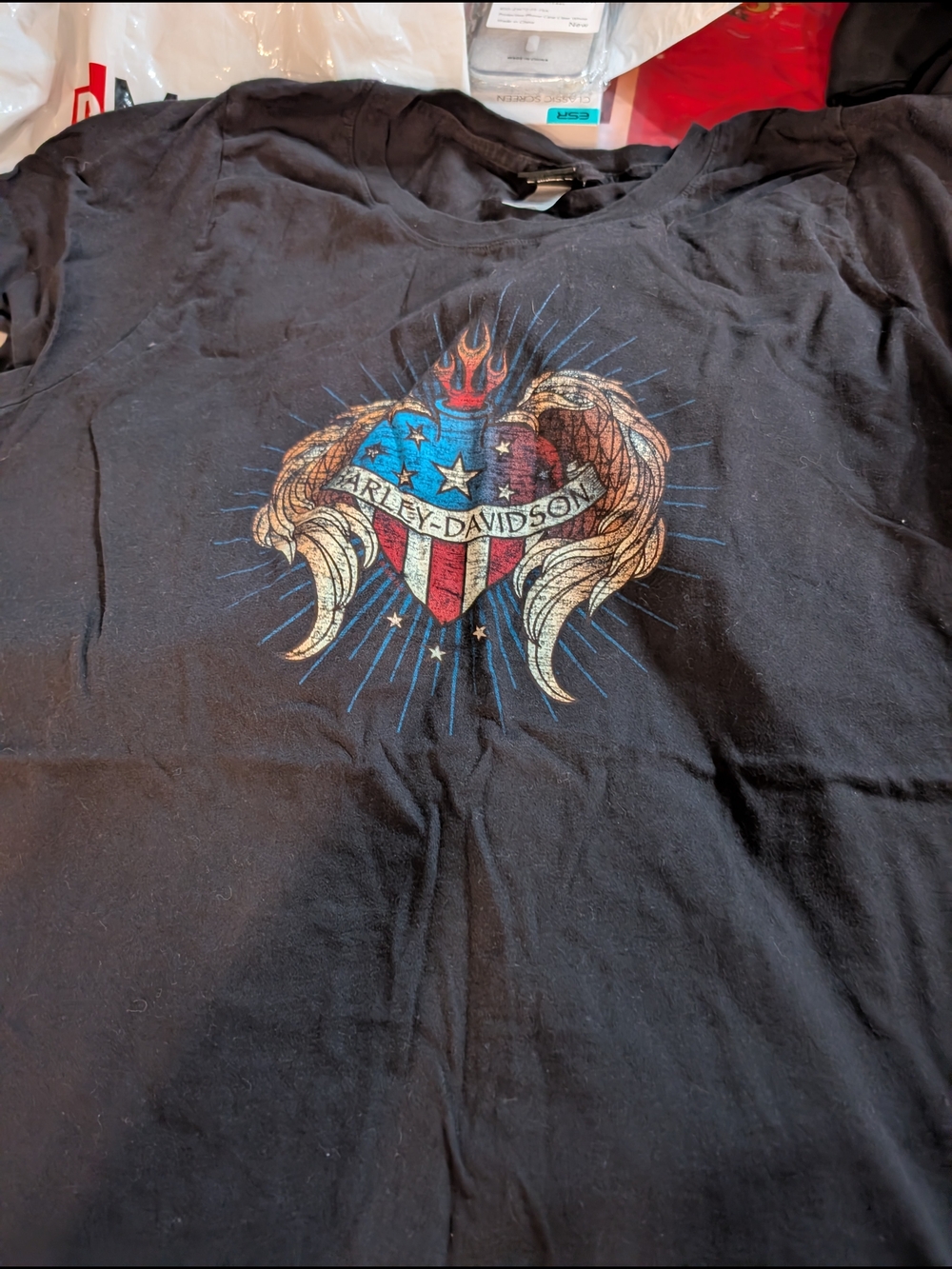 Harley-Davidson Black T‑Shirt with Red, Blue and Gold Shield Graphic